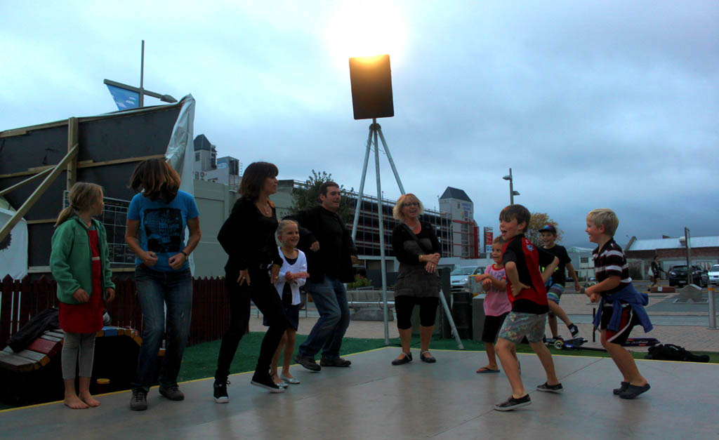 Christchurch children teaching the adults their Gangnam dance moves at a recent Gap Filler event.